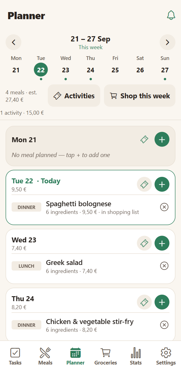 The weekly planner in HOME showing meals and a family activity on a phone